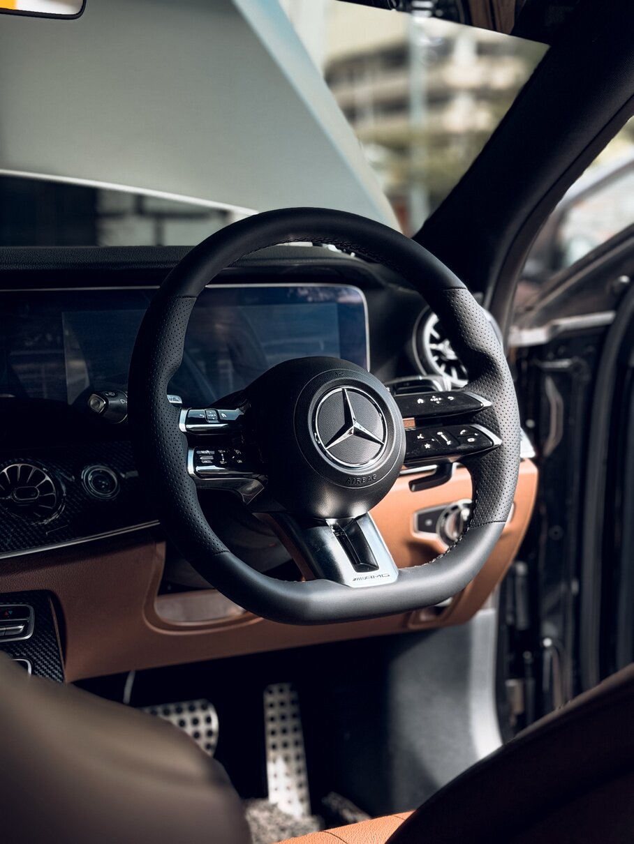DRVN Dragonfly Silver AMG steering wheel in a Mercedes G-Class